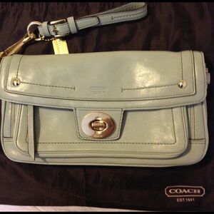 Coach legacy collection green turn lock clutch.